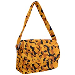Orange And Black Camouflage Pattern Courier Bag by SpinnyChairDesigns